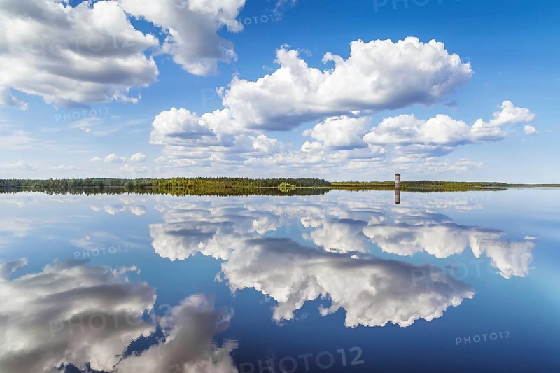Landscape with a symmetrical reflection on the Vyg river (part of the White Sea-Baltic Canal), Russia, Europe