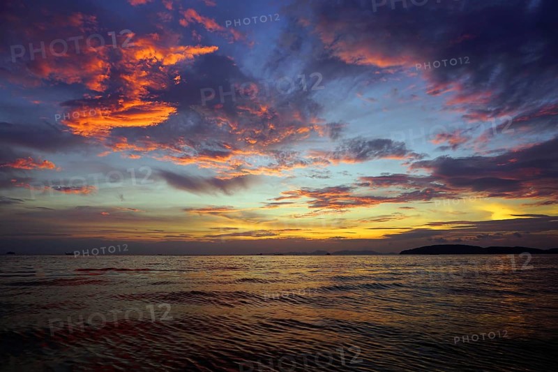 Beautiful fantastic colorful dramatic sea sunset landscape in Thailand