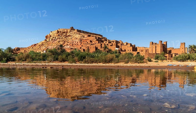 Ait Benhaddou, Morocco, 14 March, 2024: panorama landscape of Ait Benhaddou village with reflections in the Asif Ounila River, Africa