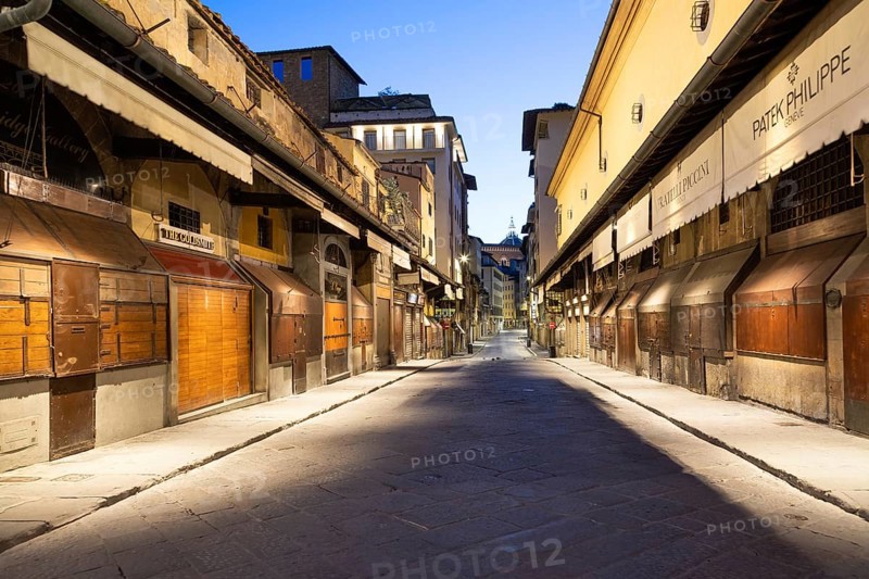 Florence, Italy, circa July 2021. Night light on Ponte Vecchio, Old Bridge, Europe