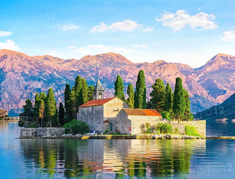 Island of Saint George among the mountains of Perast, Montenegro, Europe