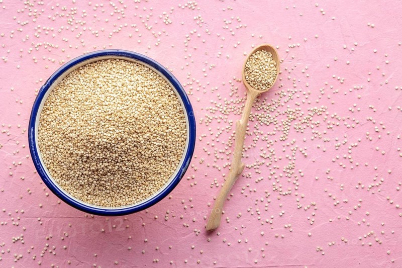 Quinoa in a bowl, healthy organic wood, uncooked, shot from above with copy space, Food photography, Food photography
