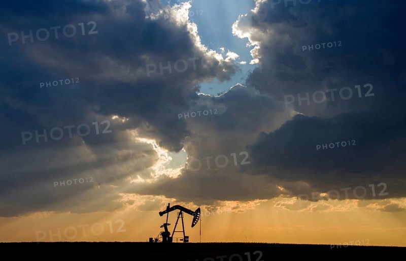 Prairie Storm Clouds Saskatchewan oil pump jack