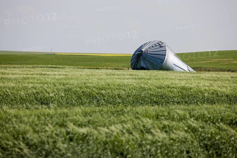 Metal Grain Bin Damaged tornado bent Canada