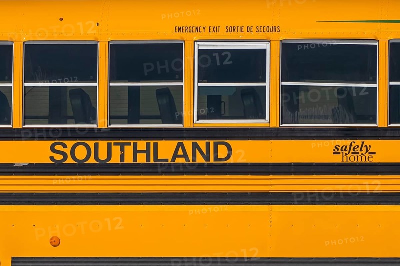 Calgary, Alberta, Canada. Mar 17, 2023. A close up to a Southland school Yellow bus