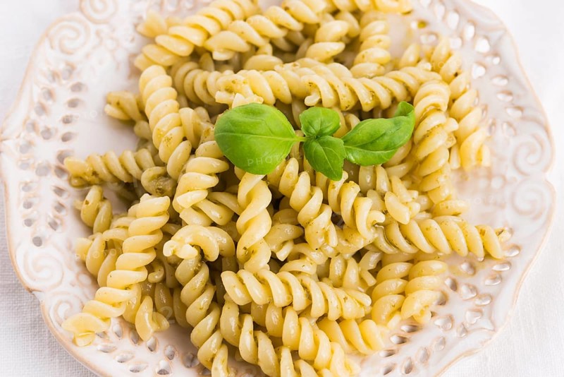 Italian fusilli pasta and fresh homemade pesto sauce