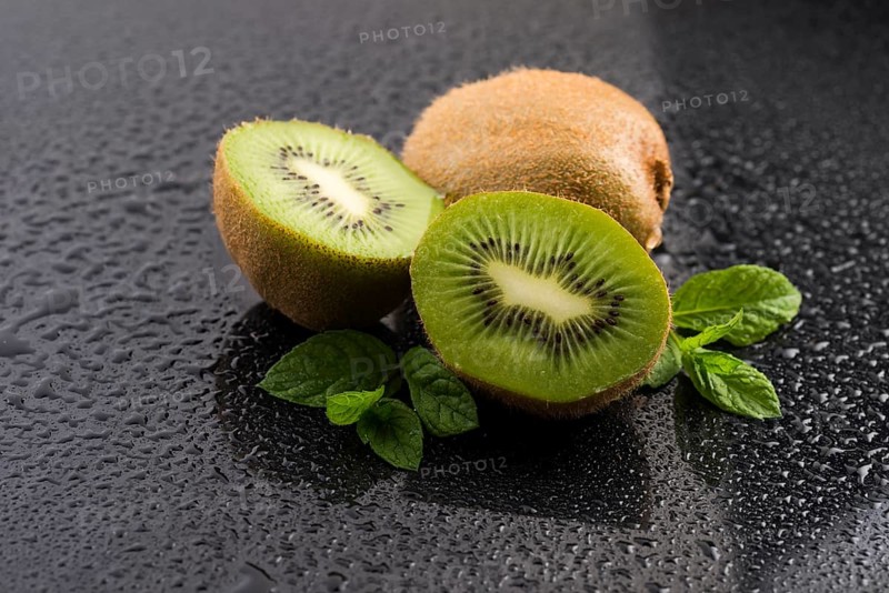 Juicy kiwi fruit and freas mint leaves