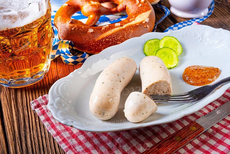 Bavarian veal sausage pretzels and beer at the Oktoberfest