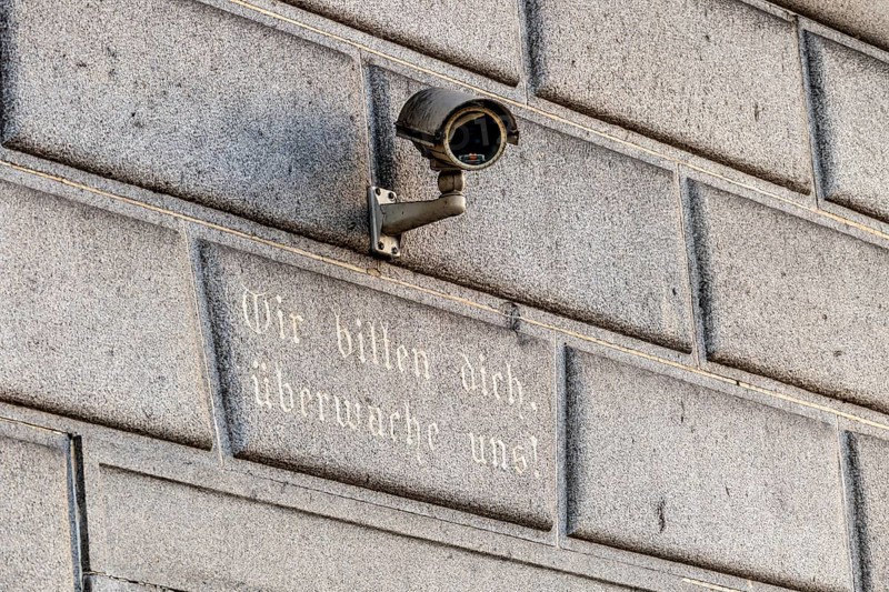 Surveillance camera on a building, symbol for surveillance, internal security, control, data protection Austria