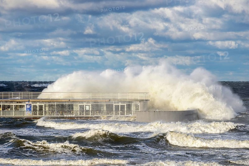 Large braking waves during a storm in Kolobrzeg on the Polish Baltic coast
