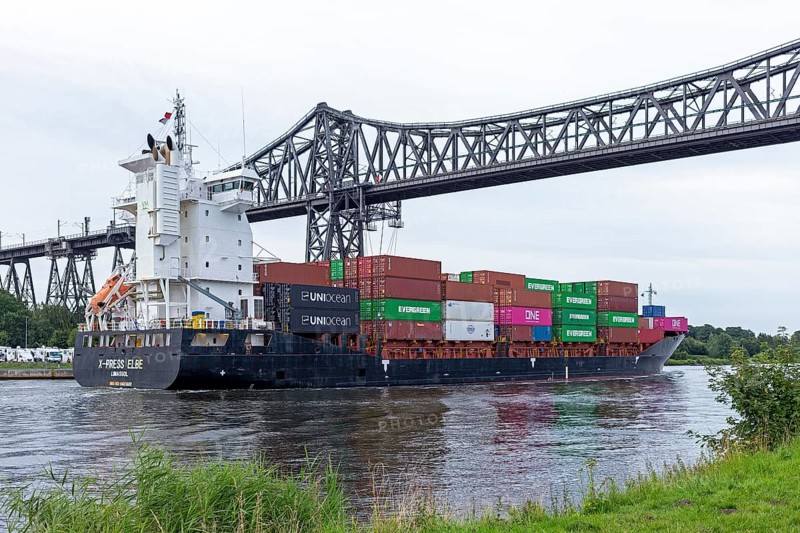 Container ship, cargo ship, high bridge, Kiel Canal, Rendsburg, Schleswig-Holstein, Germany