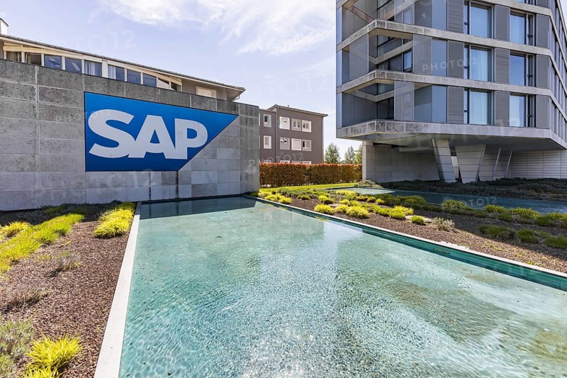 Logo and building of the listed software company SAP, headquarters. Walldorf, Baden-Württemberg, Germany