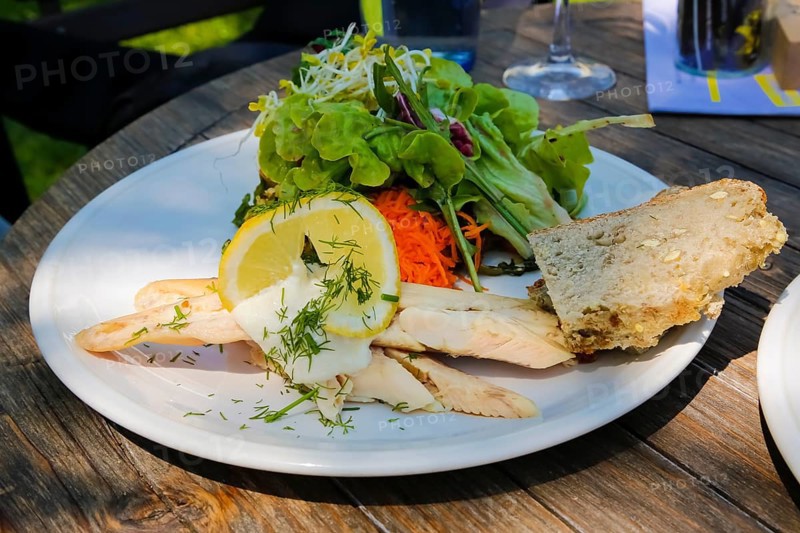 Swabian cuisine, smoked trout fillet from the Echaz valley, cold starter, horseradish, dill, slices of bread, mixed salad, fish arranged on a plate, regional, home cooking, typical Swabian, traditional cuisine, food photography, Germany