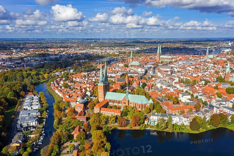 Aerial view over the river Trave and church towers in the old town of the Hanseatic City of Lübeck in autumn, fall, Schleswig-Holstein, Germany