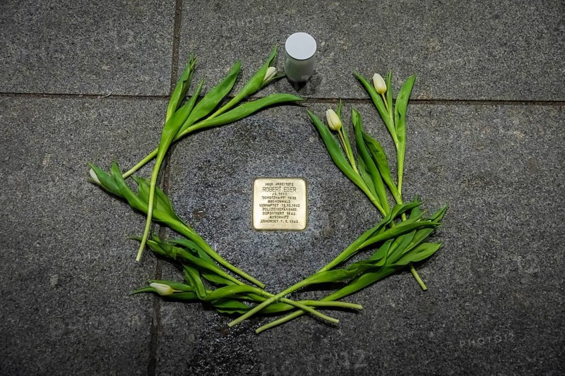 Stolpersteine in the city centre of Dresden commemorate the fates of Dresdeners during the 3rd Reich. Here is the stone of Robert Jäger, murdered in Auschwitz, Dresden, Saxony, Germany