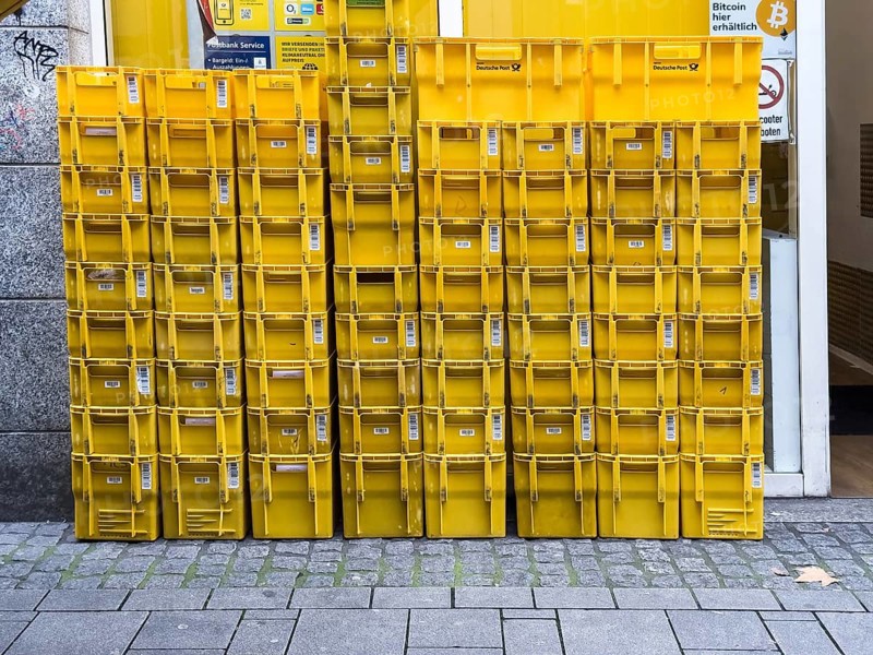 Stack of yellow post boxes in Düsseldorf, Germany