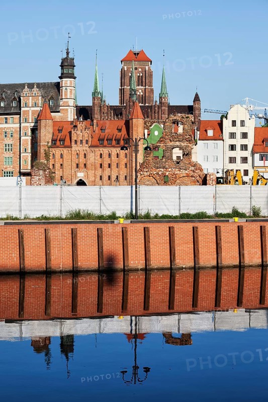 Old Town of Gdansk skyline in Poland, embankment water reflection on Old Motlawa River