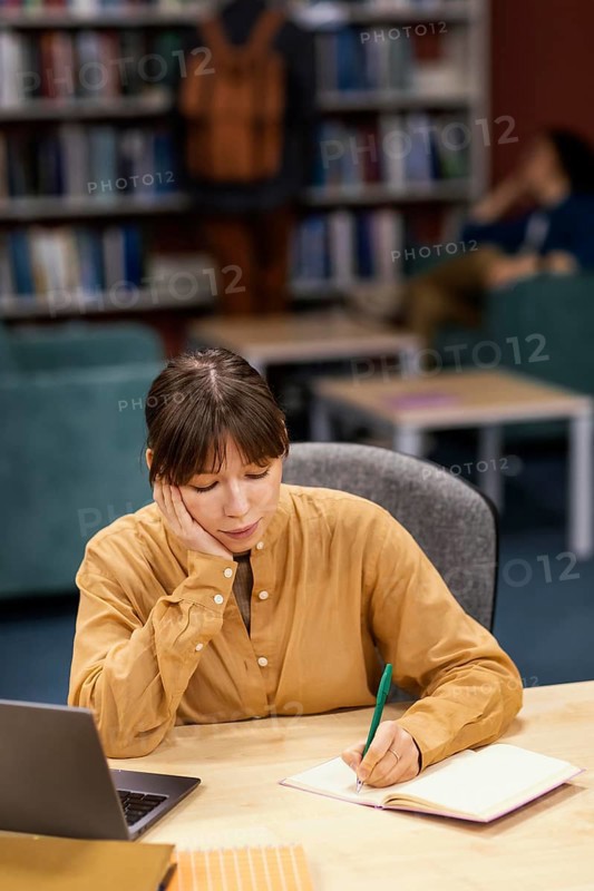 Girl studying university library
