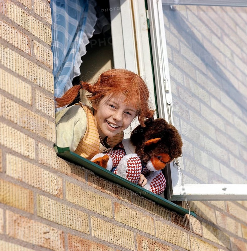 Inger Nilsson. Born in 1959. Swedish child actress known for playing the role of Pippi Longstocking in the TV series and movies based on the character of author Astrid Lindgren. Here dressed in Pippi clothes and the red hair in braids. A stuffed animal represents the monkey Herr Nilsson who appeared in the films. 17 February. 1970