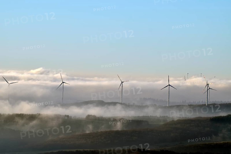 View from the Wildenburger Kopf in the Hunsrück-Hochwald National Park of the Nahe region with wind turbines on a misty winter morning, Rhineland-Palatinate, Germany