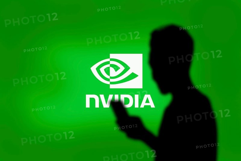 Nvidia logo on smartphone screen with AI in the background. Nvidia Corporation is an American multinational corporation and technology company.