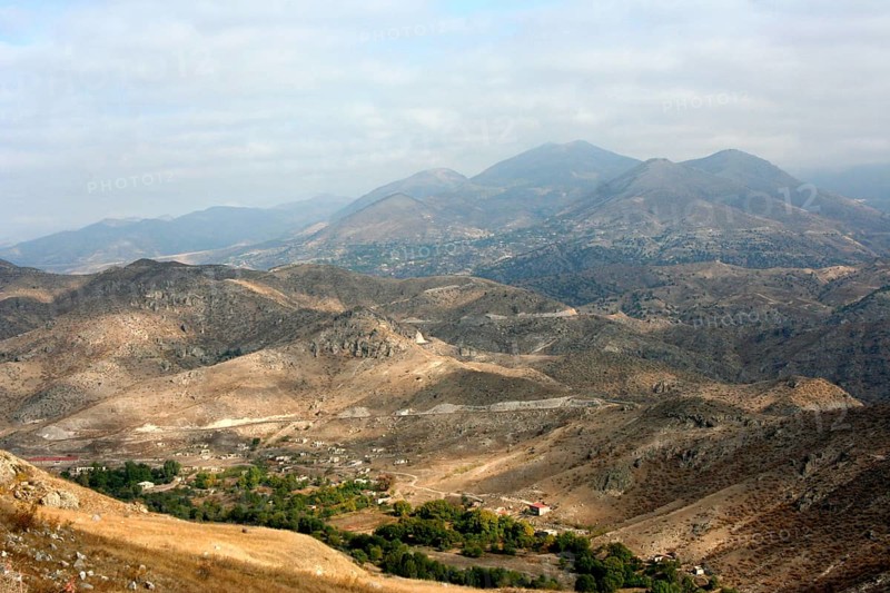 View of the independence-seeking Nagorno-Karabakh Republic from the road to Goris, buildings destroyed by the civil war can be seen in the valley
