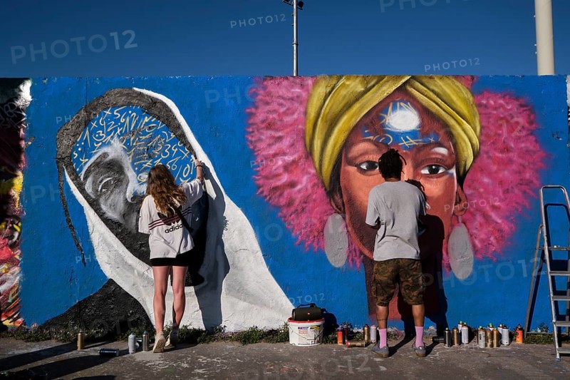Germany, Berlin, 09.06.2024, Sunday afternoon in Mauerpark, Graffiti Wall (inner wall), Eme Freethinker, at work