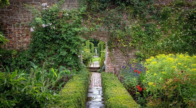 Beautiful flowers, trees and plants and garden landscaping in Sissinghurst Caslte Gardens in Cranwood, England, United Kingdom
