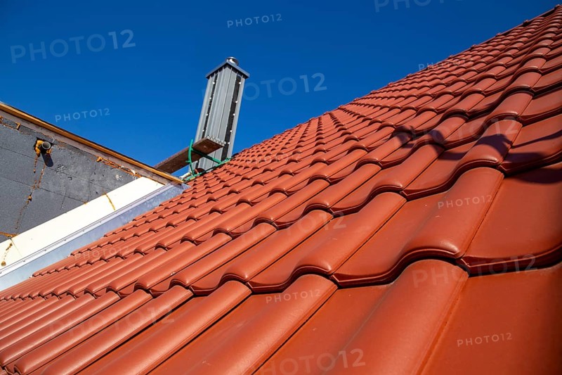 Close-up of a tiled roof that has just been tiled over