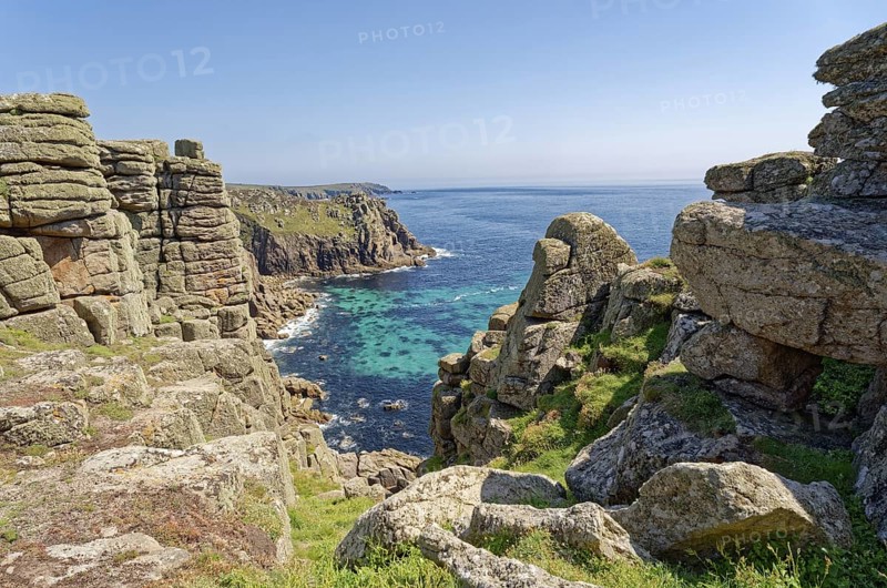 Rock formation off the west coast of England on the Atlantic Ocean. Land's End, the tip of the headland in the west of Cornwall, is the most westerly point in England. Land's End, Sennen, Penzance, Cornwall, South West England, Great Britain