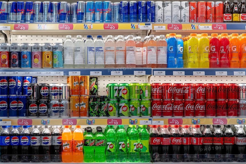 Sales shelf Red Bull, beverages Pepsi, Coca Cola