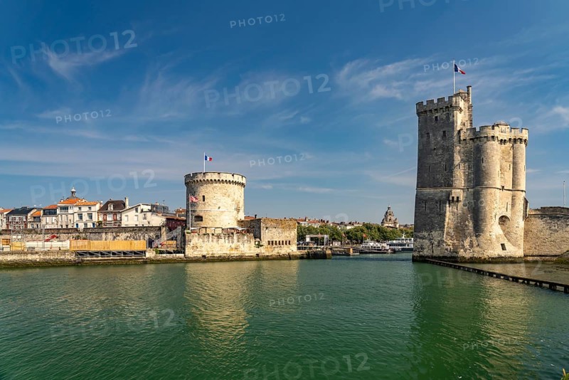 Harbour entrance to the old Vieux Port with the medieval towers Tour St.-Nicolas and Tour de la Chaine, La Rochelle, France