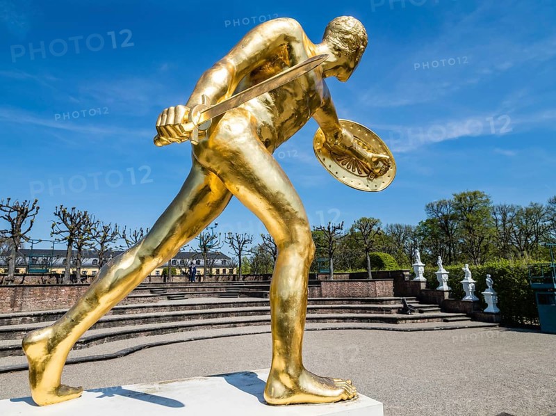 Golden sculpture, warrior with shield and sword, Herrenhausen Gardens, Baroque garden at castle Herrenhausen, Herrenhäuser Gärten, Hanover, Germany