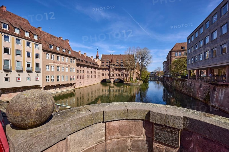 Heilig-Geist-Spital, Spital-Apotheke, river Pegnitz, museum bridge, facades, windows, sandstone wall, historic hospital, pharmacy, signpost to the building, general architecture, trees, reflections, water surface, blue sky, cirrostratus clouds, Nuremberg, Middle Franconia, independent city, Bavaria, Germany