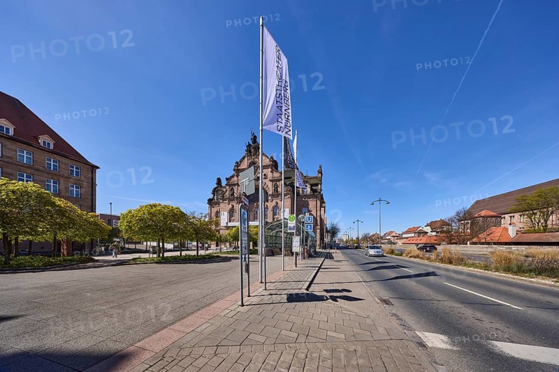 Flags, flagpoles, Nuremberg State Theatre, theatre, trees, general architecture, bus stop, pavement, concrete paving stones, blue sky, cirrostratus clouds, Frauentorgraben, Nuremberg, Middle Franconia, independent city, Bavaria, Germany
