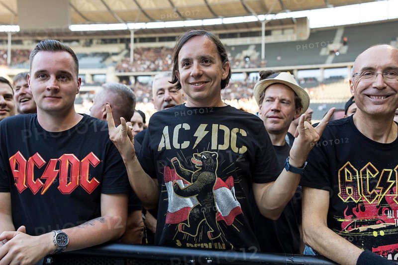 Fan in the front row with AC/DC Berlin shirt in front of the concert of AC/DC live on Power Up Tour 2025 at the Olympiastadion Berlin on 30.06.2025