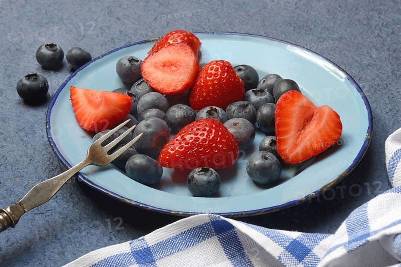 Plate with strawberries and blueberries, Fragaria, Vaccinium