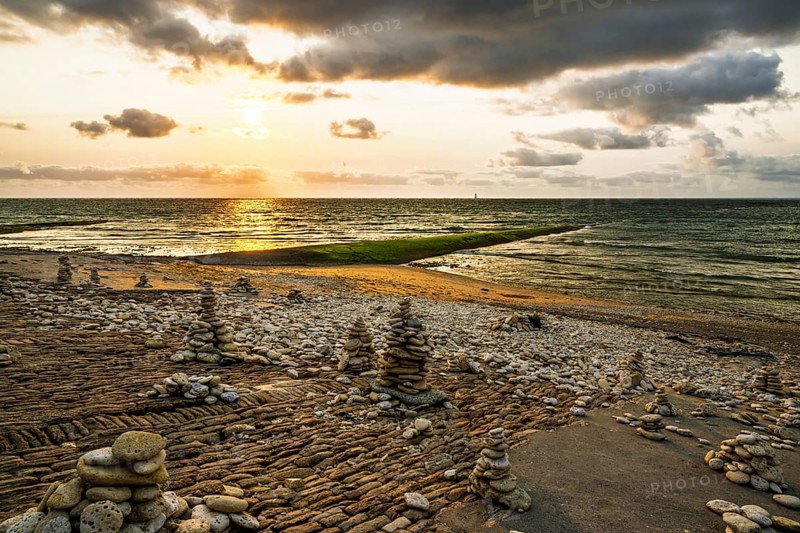 Sunset over beach of WHALE LIGHTHOUSE, Saint-Clement-des-Baleines, Atlantic, France