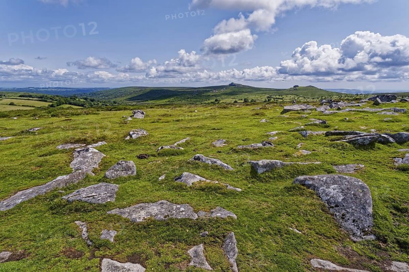 Stones and landscape at the top Tor tor rock hill in Dartmoor National Park. Widecombe-in-the-Moor, Bovey Tracey, Devon, South England, Great Britain