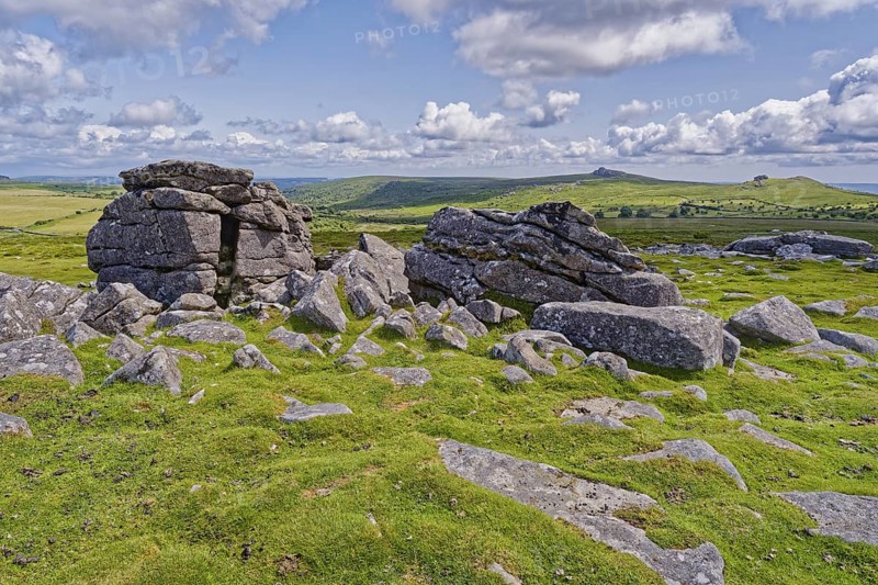 Stones and landscape at the top Tor tor rock hill in Dartmoor National Park. Widecombe-in-the-Moor, Bovey Tracey, Devon, South England, Great Britain