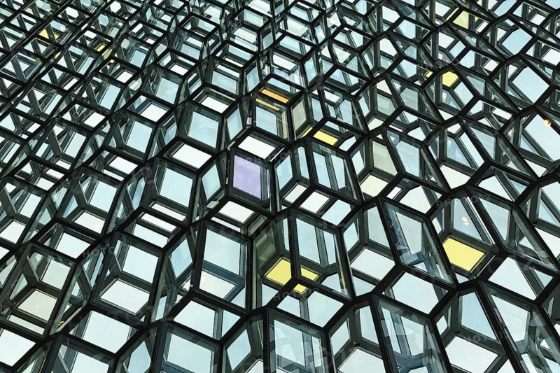 Honeycomb windows, glass façade, Harpa concert hall, architect Henning Larsen, façade by artist Ólafur Elíasson, Reykjavík, Iceland