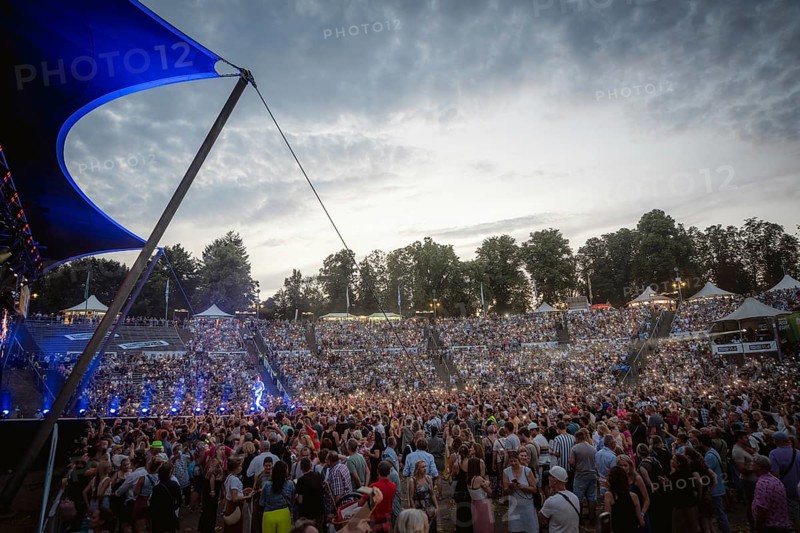 Sea of lights with Sebastian Oswald, one of the presenters at the Berliner Rundfunk 91.4 Open Air in Berlin's Parkbühne Wuhlheide on 5 July 2025