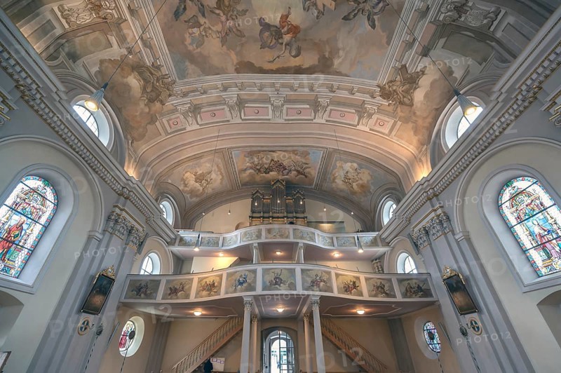 Interior with organ loft of the baroque parish church of St Nicholas, 1725, Tannheim, Austria