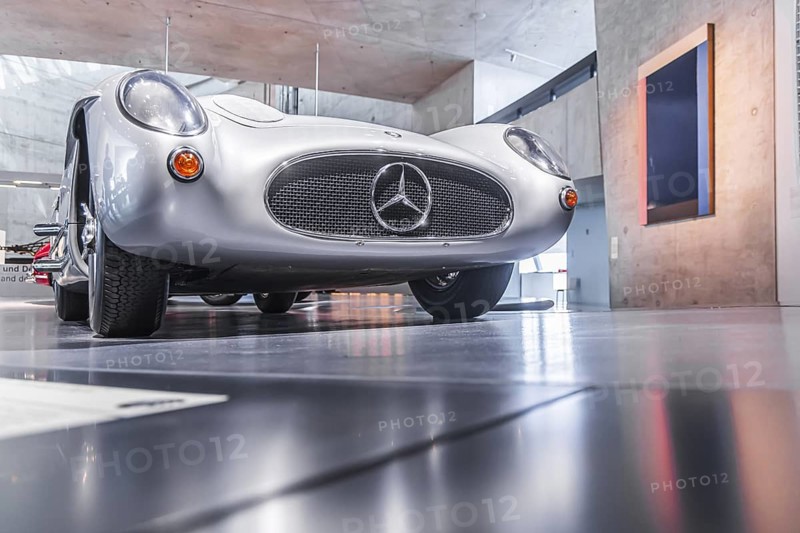 Mercedes-Benz 300 SLR Uhlenhaut Coupé from 1955. Two examples were built, one was auctioned. With proceeds of 135 million euros, it is the most valuable car in the world. The Mercedes-Benz Museum in Stuttgart presents a journey through the automotive history of the global corporation. The history of the Mercedes star begins with the first automobile in 1886. 160 vehicles are on display. Stuttgart, Baden-Württemberg, Germany