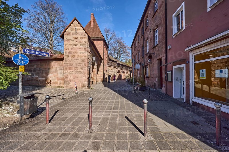 Old town, city fortification, city wall, buildings, trees, bollards, blue sky, Spittlertor wall, Nuremberg, Middle Franconia, independent city, Bavaria, Germany