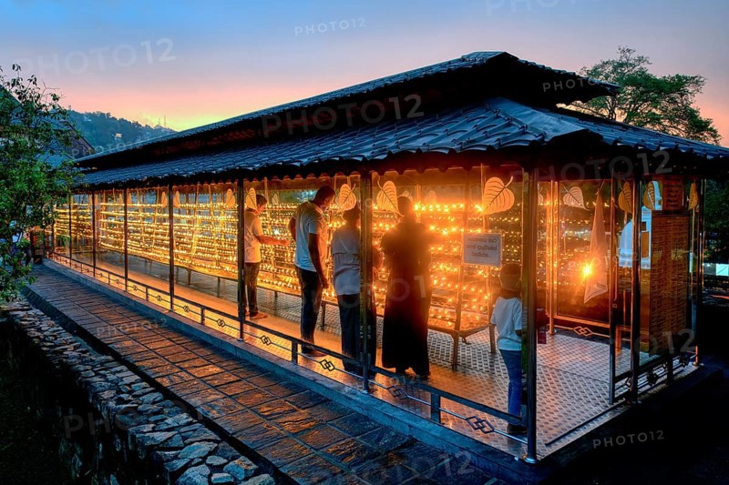 Temple of the sacred Tooth Relic or Sri Dalada Maligawa, Oil candel fence, Kandy, Sri Lanka