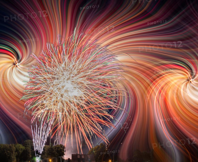 Colorfull fireworks display on the night sky with twirl effect