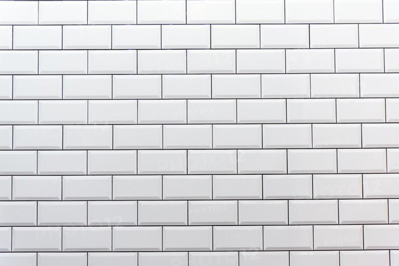 Background from a white tile wall