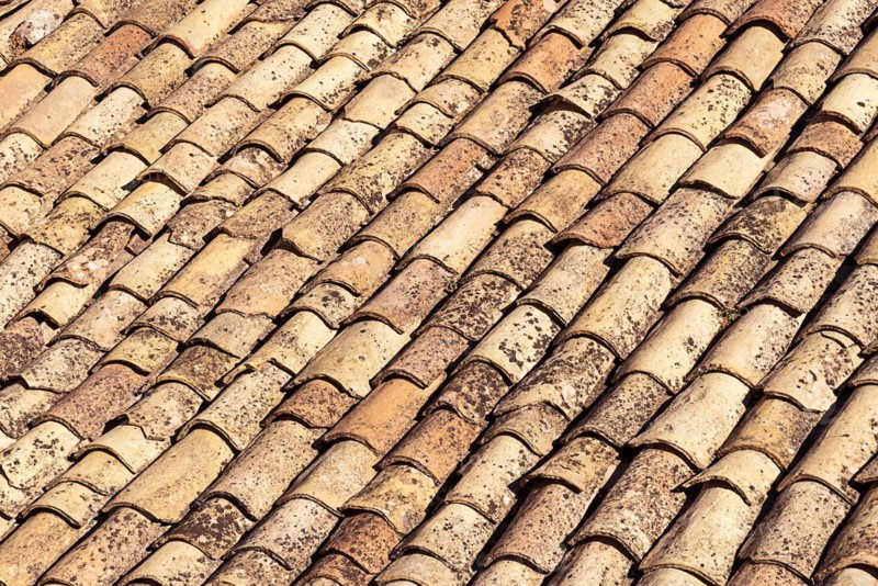 Old tiles on a roof in Sicily, Italy