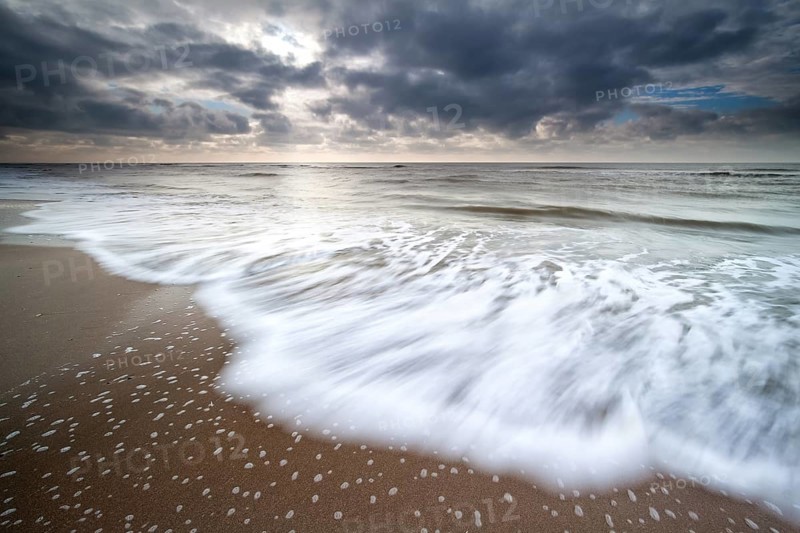 North sea waves on sand beach, Zandvoort, Netherlands